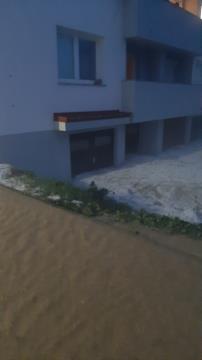 Garaže pri večstanovanjkem objektu na Glavni cesti 54, Mirna